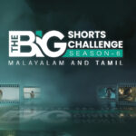 Short film audience in a cinema hall watching on big screen